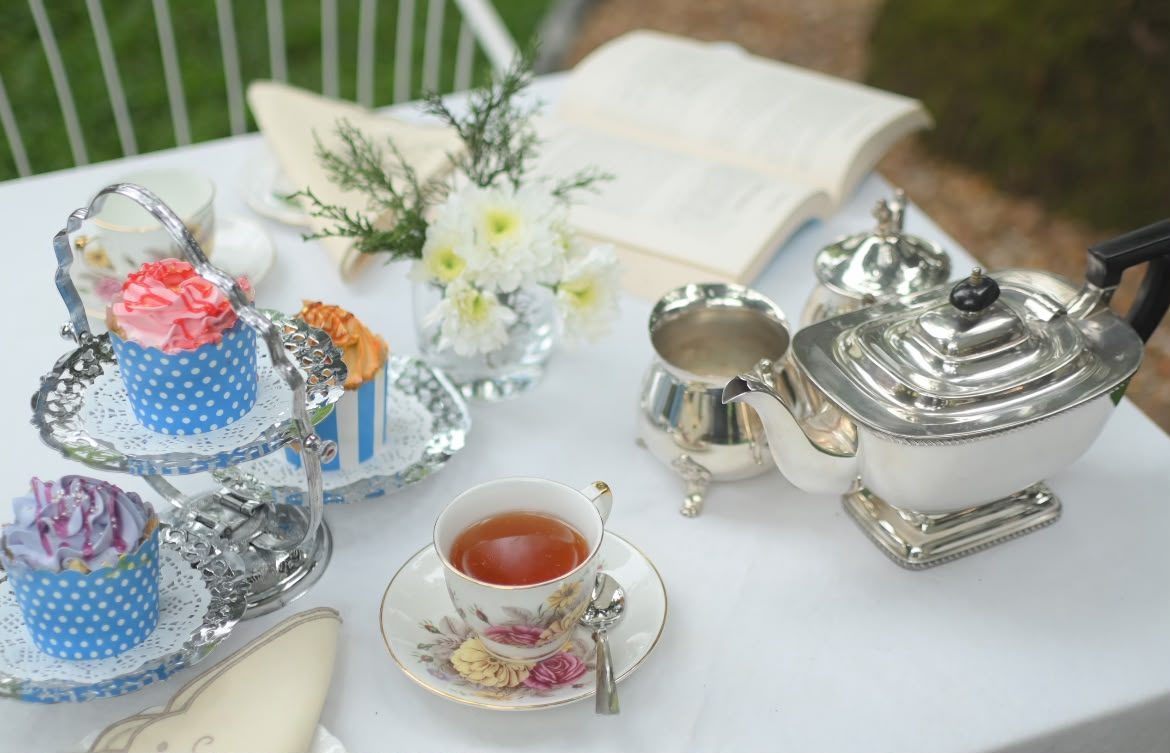 Silver tea service and cupcakes at Scarlet's Tea Garden