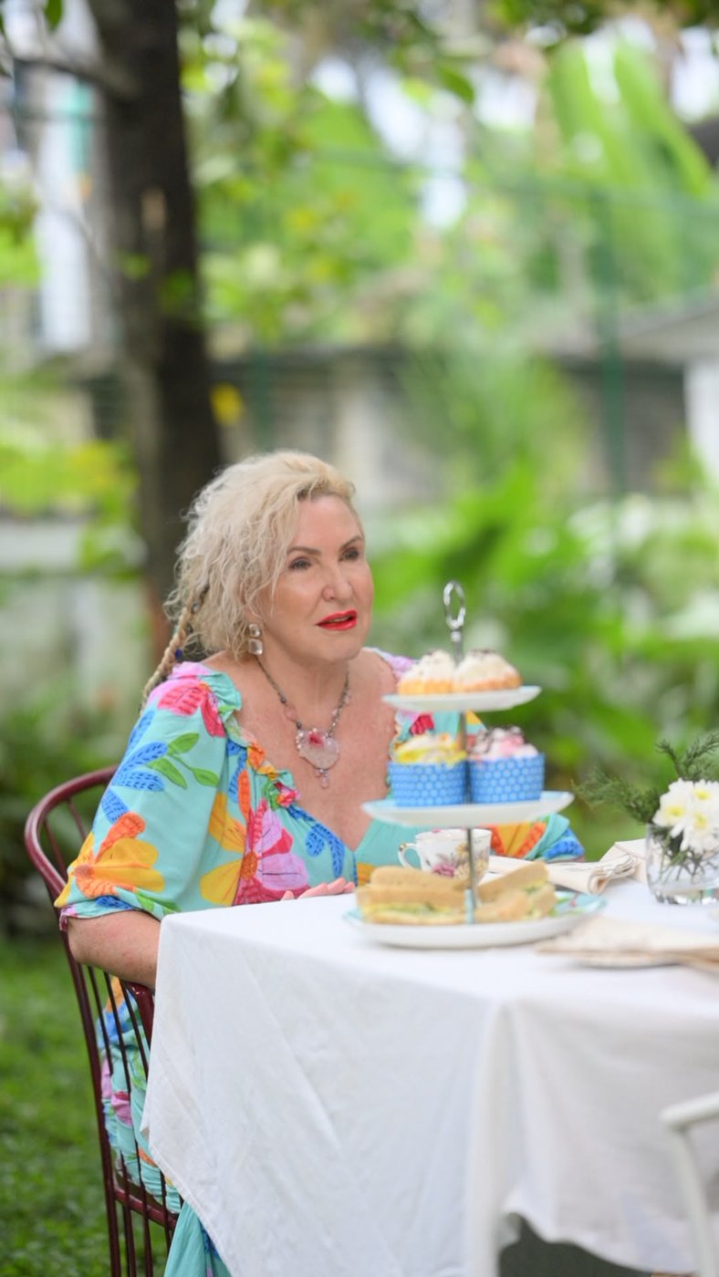 Scarlet, host of Scarlet's Cottage & Tea Garden